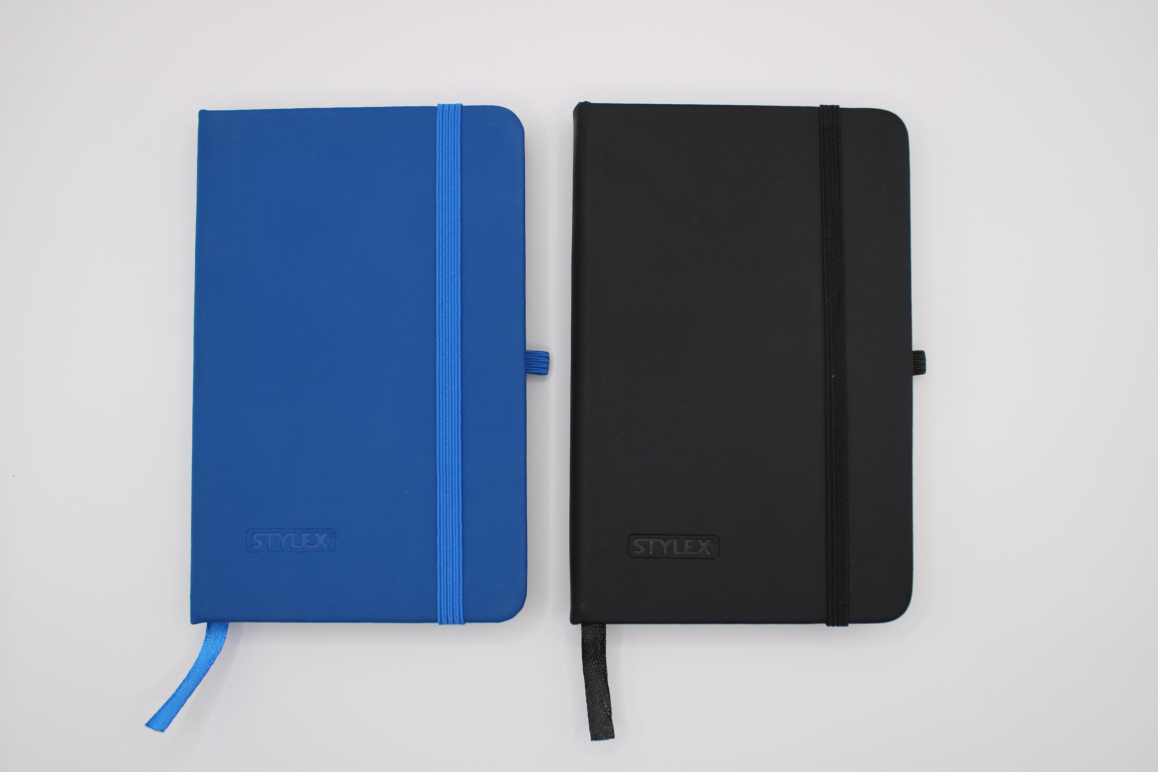 Notizbuch Stylex, Notebook, farbig sortiert, 192 Seiten, kariert, Verschlussgummi, Lesezeichen, Einstecktasche, FSC, ca. 9 x 14 cm, 29201